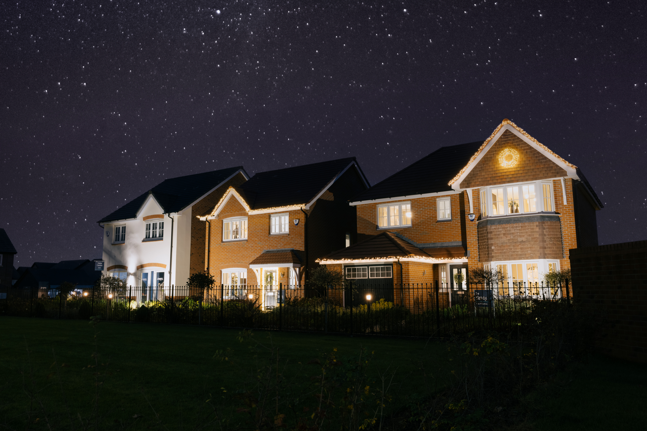 Christmas lights on the outside of show homes at Summers Bridge, Deeside 